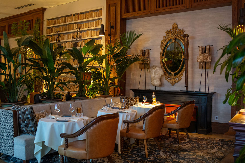 a room with tables and chairs