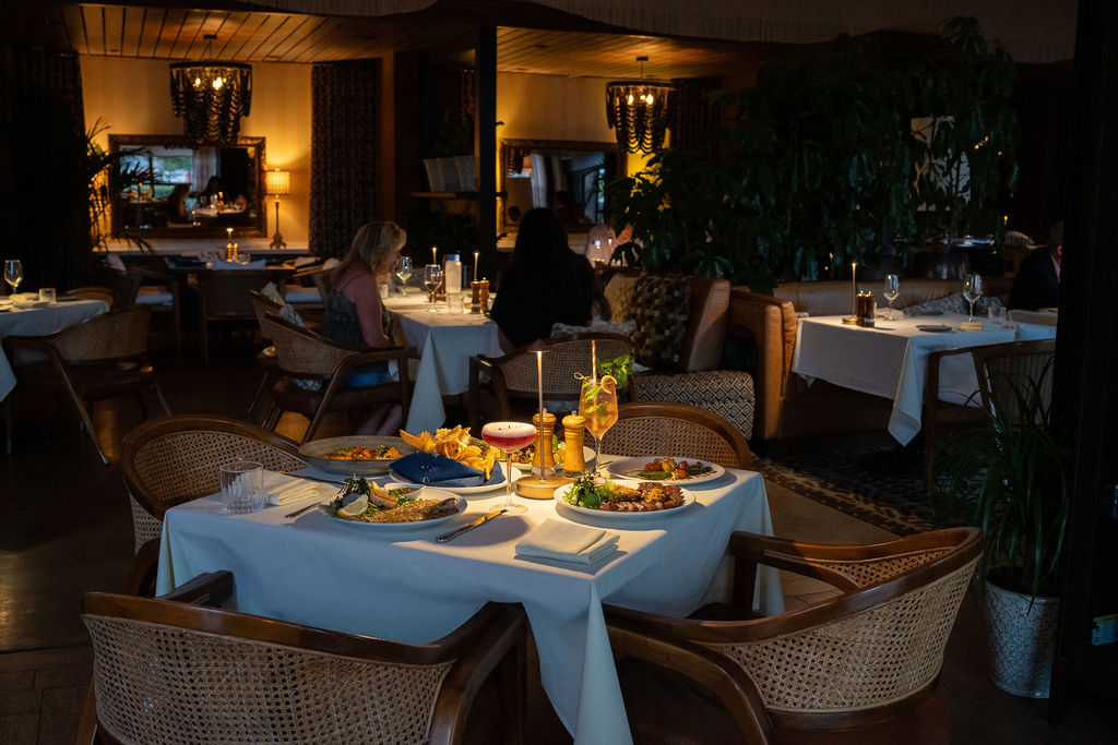 a restaurant with tables and chairs