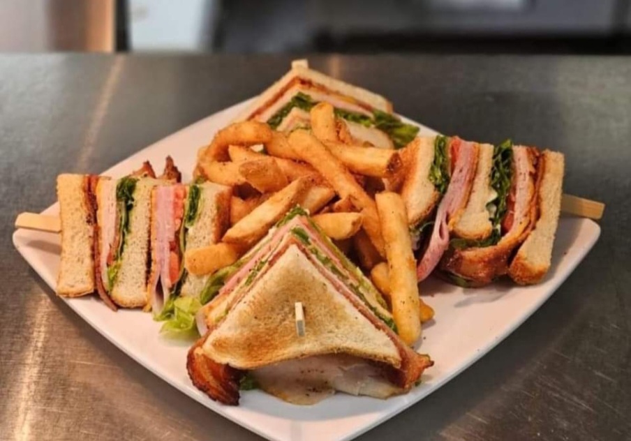 a sandwich cut in half on a plate