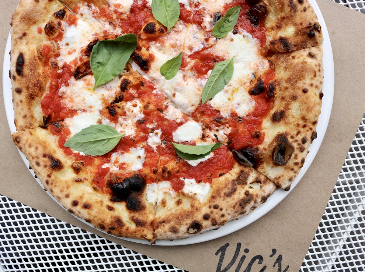a slice of pizza on a plate