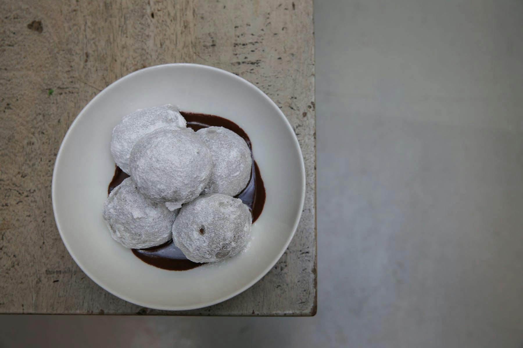 a doughnut is sitting in a bowl