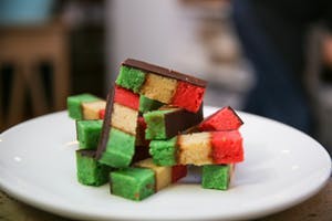 a close up of a piece of cake on a plate