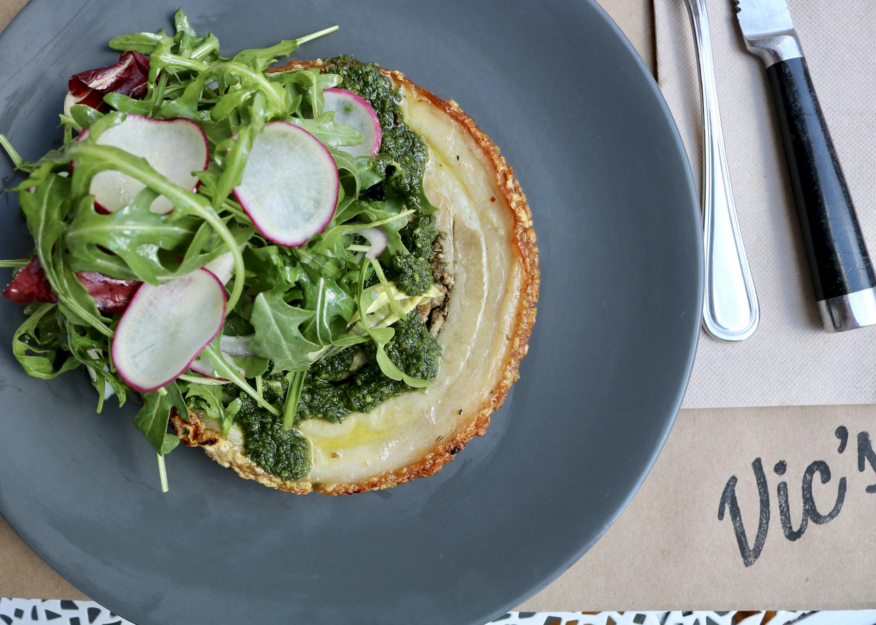 a bowl of salad on a plate