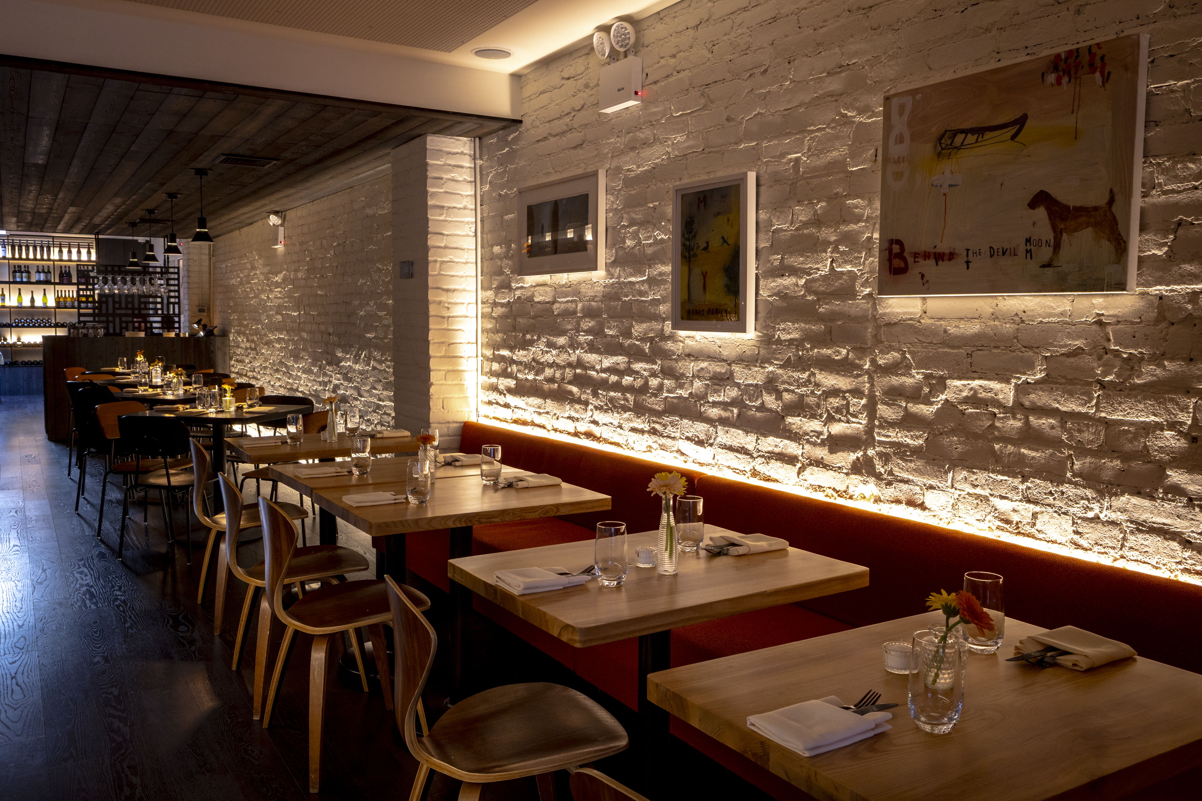 a restaurant with tables and chairs