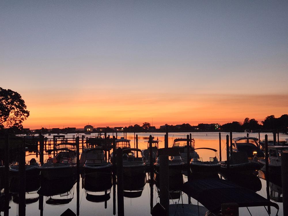 a sunset over a body of water