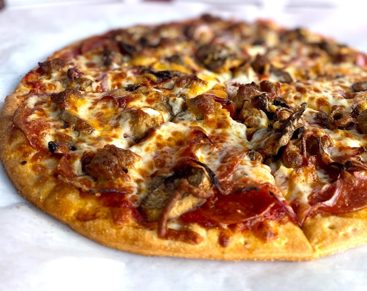 Taste the RAILROAD GRADE Pizza's Rich Flavors