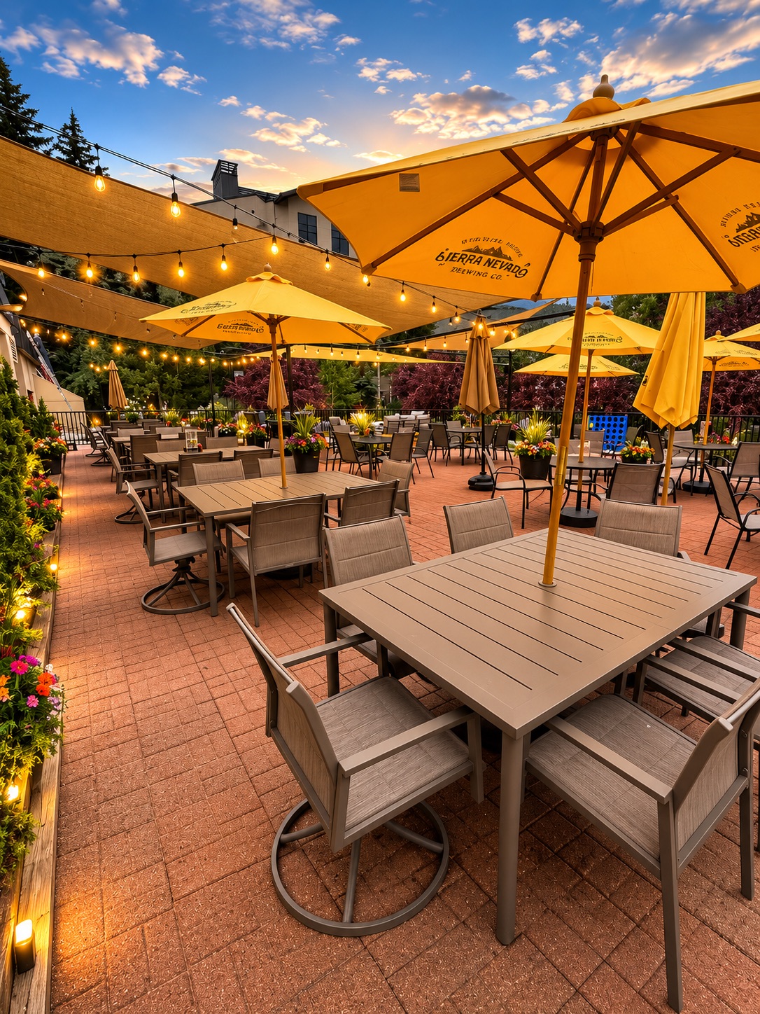tables and chairs under umbrellas on a patio