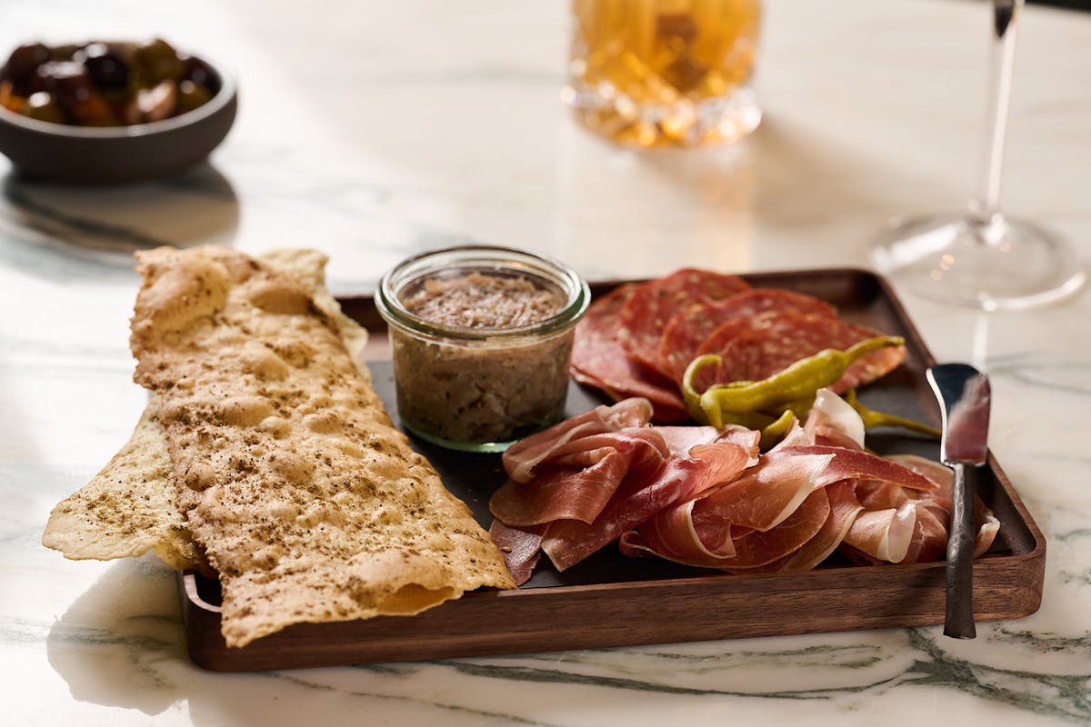 a piece of bread on a plate on a table