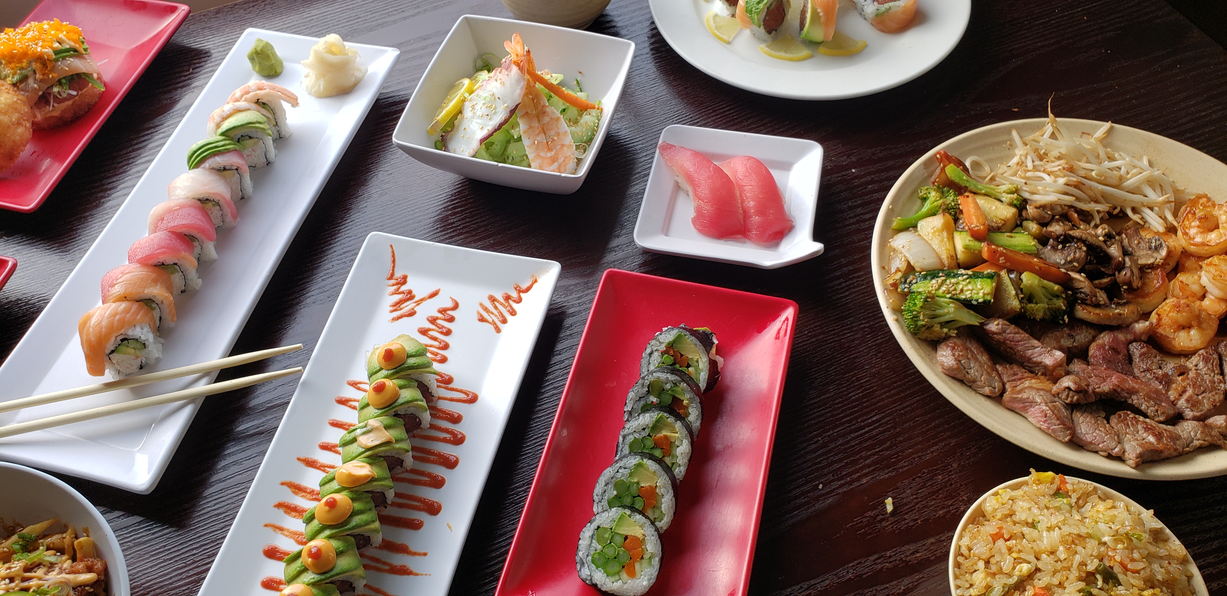 a plate is filled with different types of food on a table