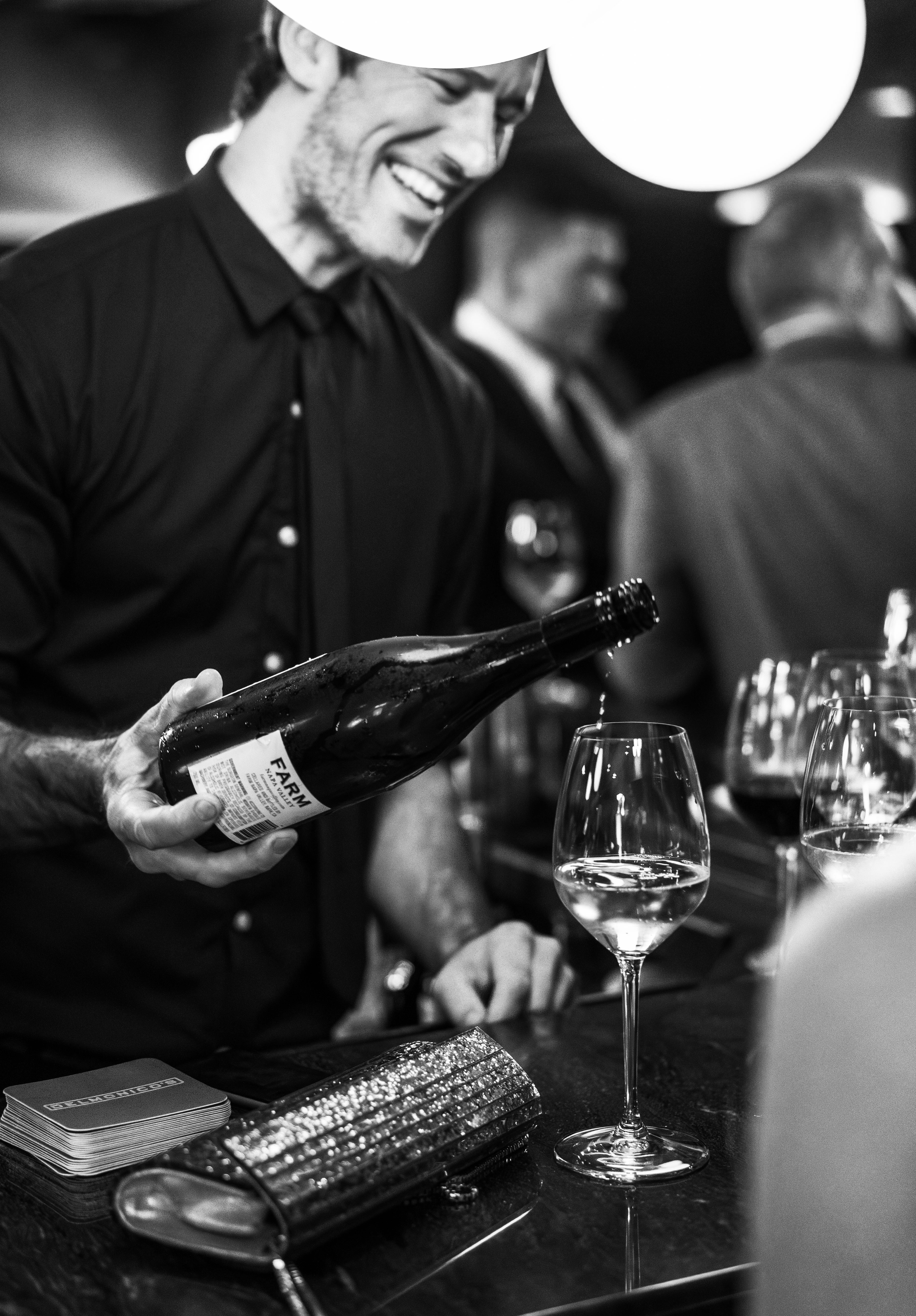 a man holding a glass of wine