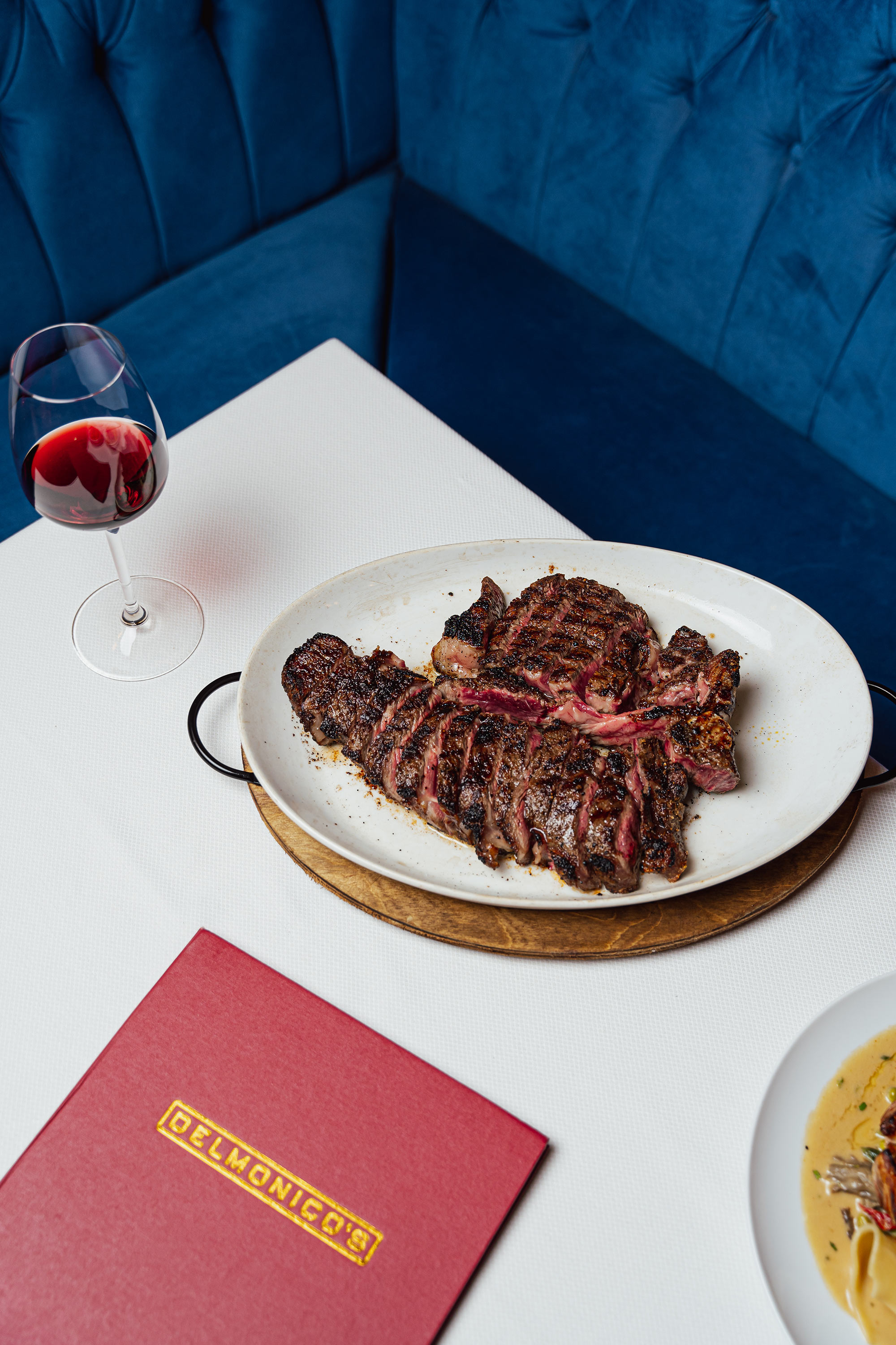 Signature dry-aged steak at Delmonico's steakhouse NYC
