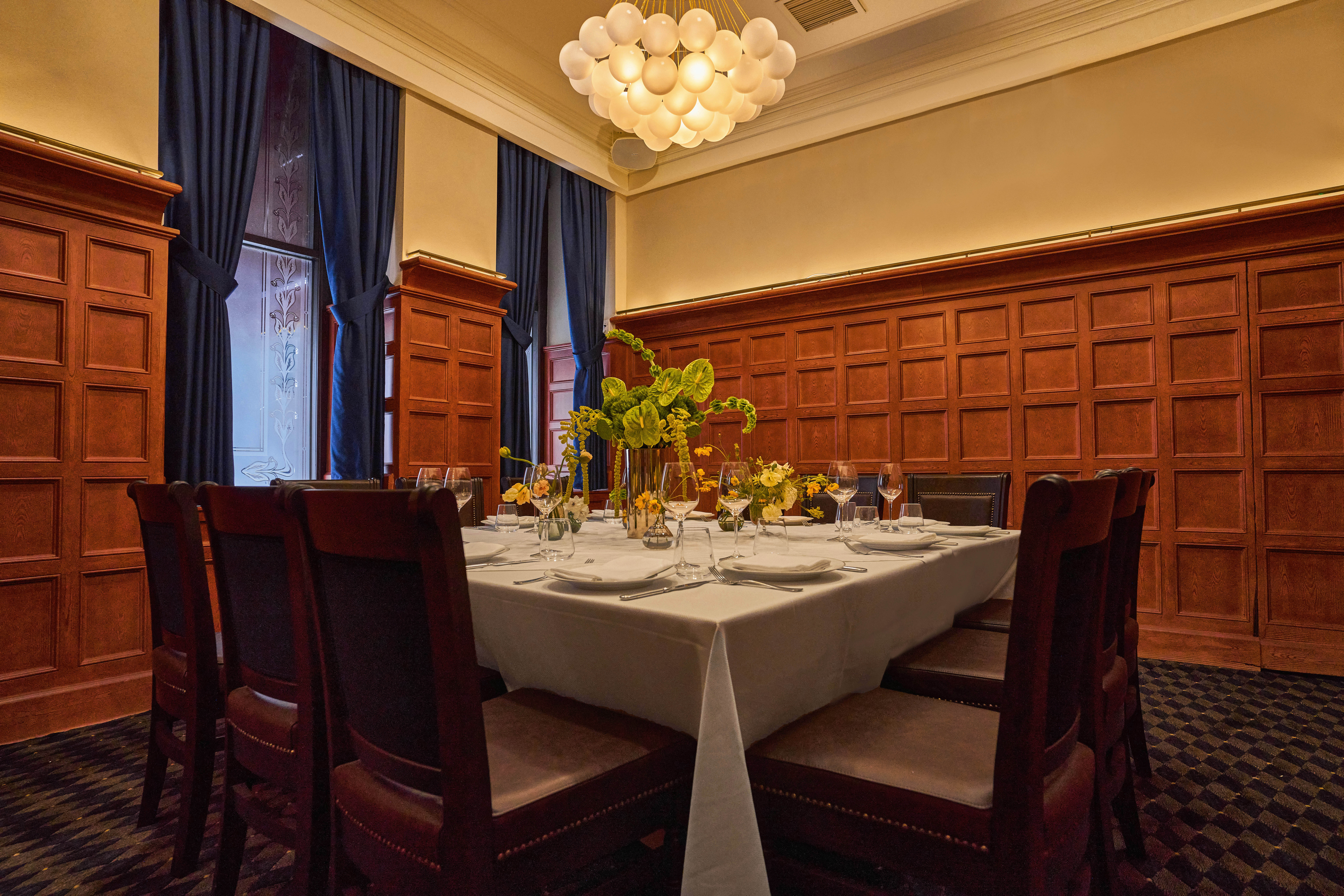 Elegant private dining room setup at Delmonico's
