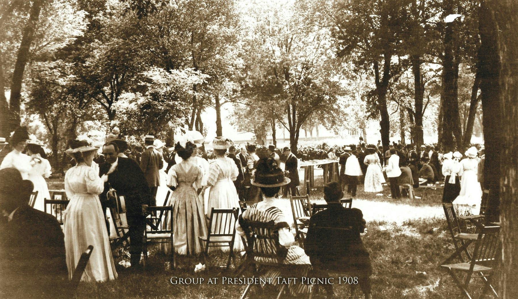 a group of people in an old photo of a person