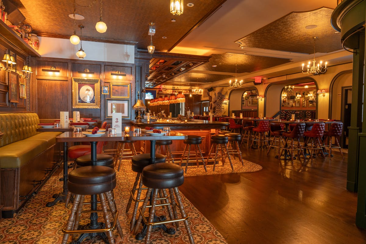 a room filled with furniture and a table in a restaurant