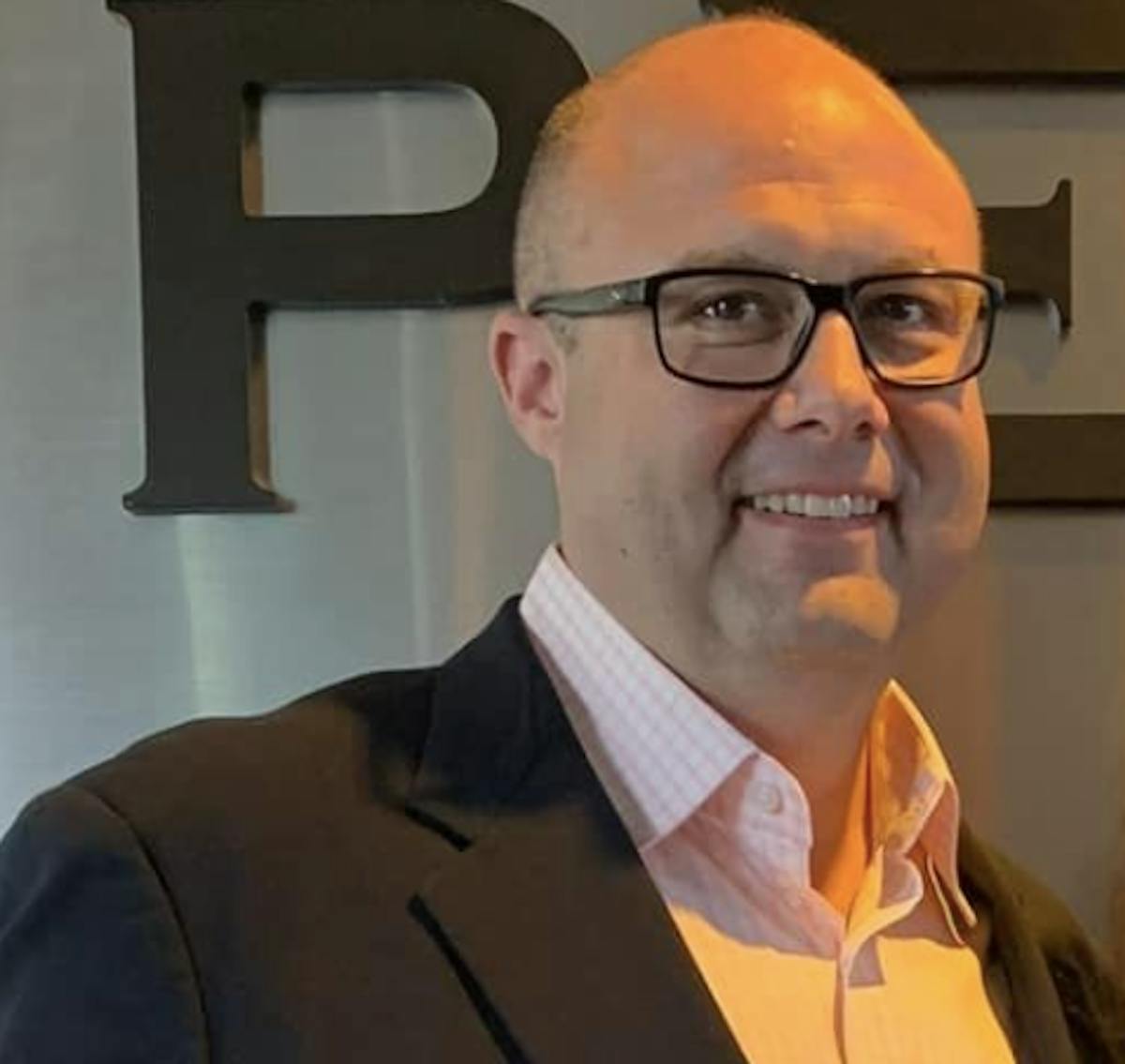 a man wearing glasses