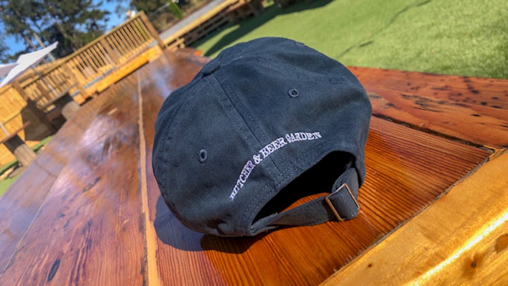 a hat on top of a wooden table