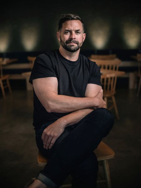a man sitting on a chair