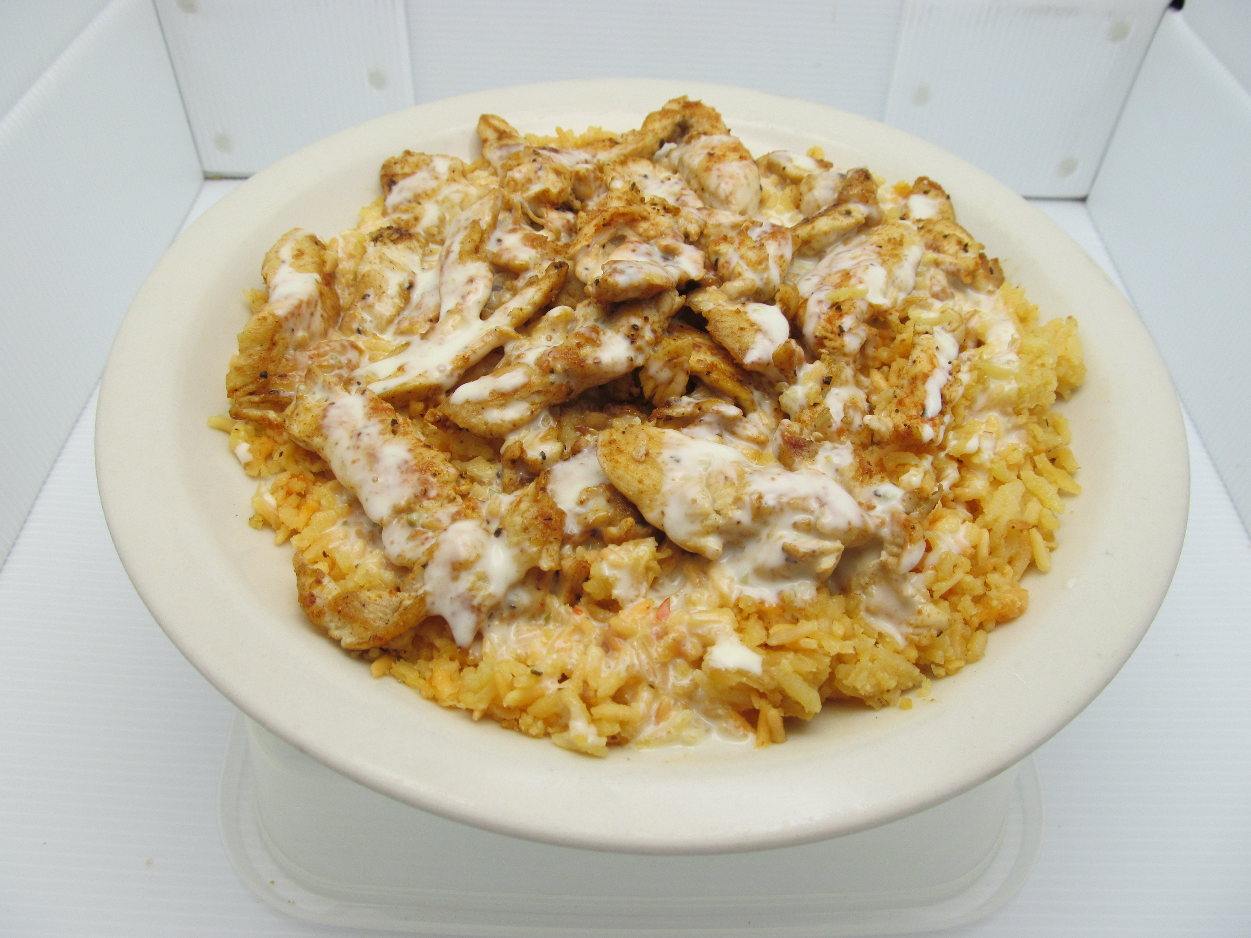a close up of chicken and rice