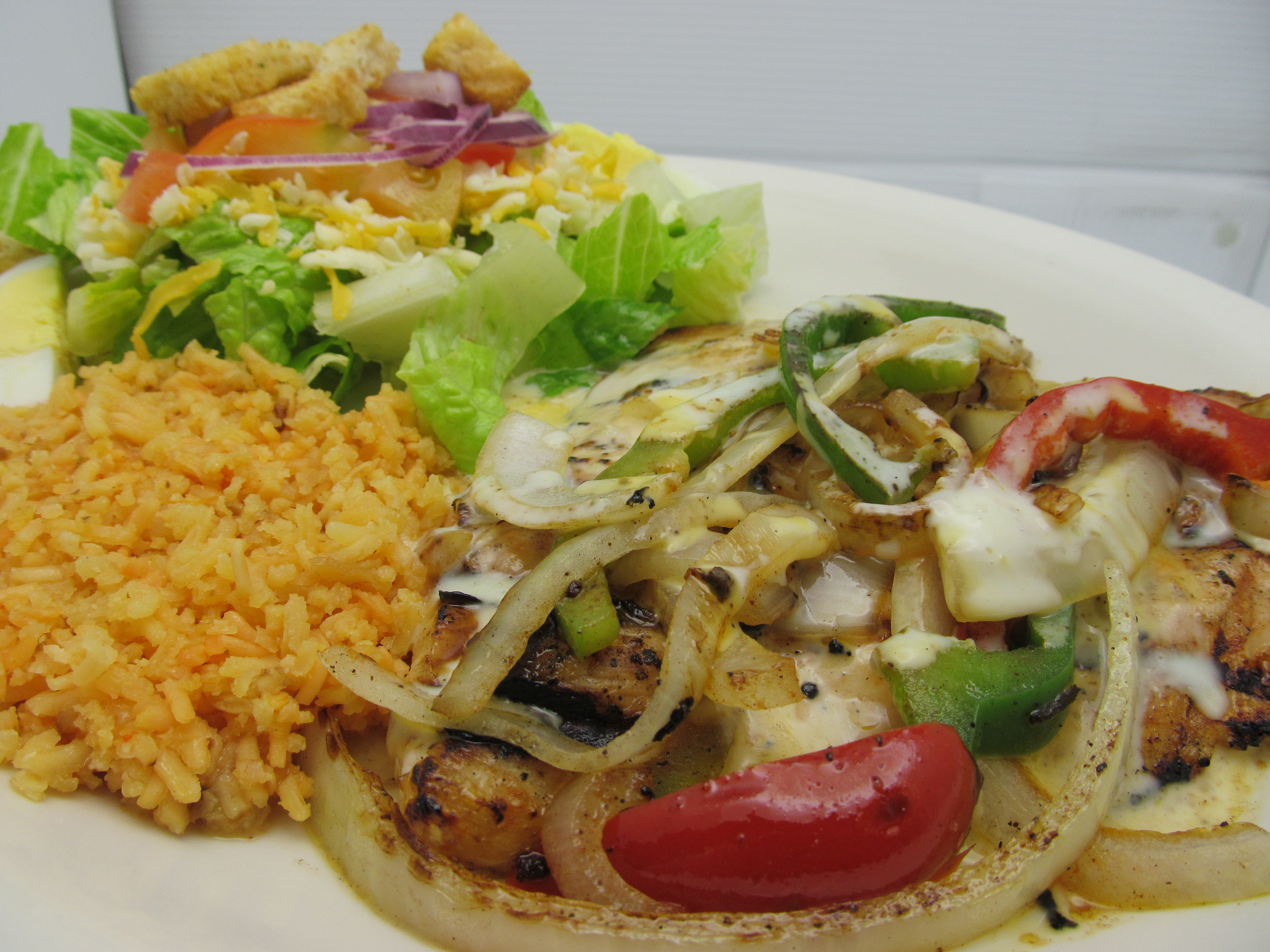 a close up of tostadas with rice