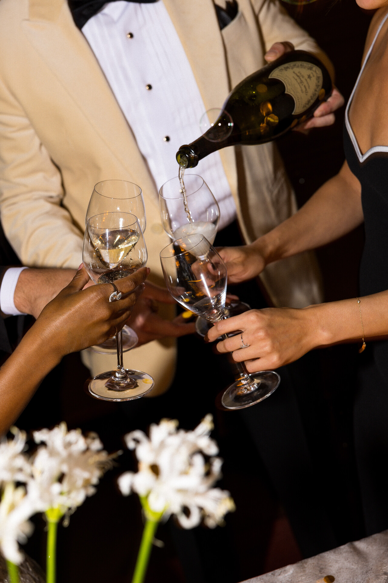 group toasting champgne