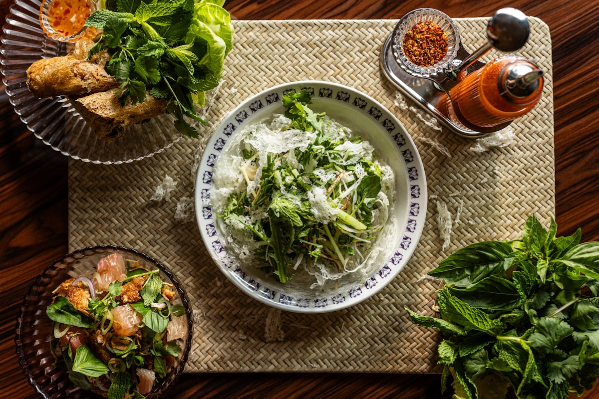 a salad sitting on top of a wooden table
