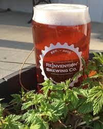a glass of beer on a table