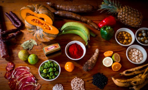 a variety of food on a wooden table