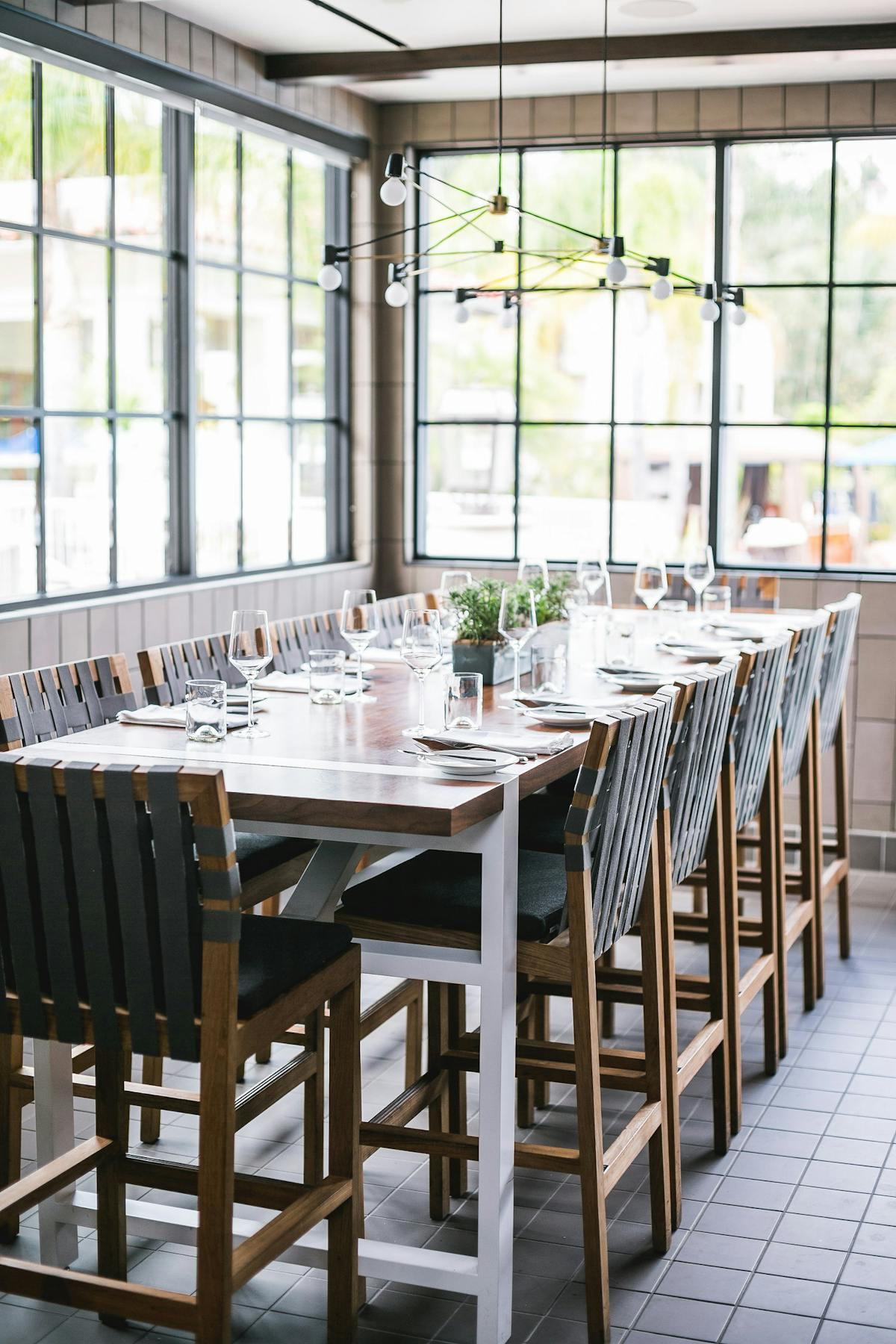 a table with several plates and chairs