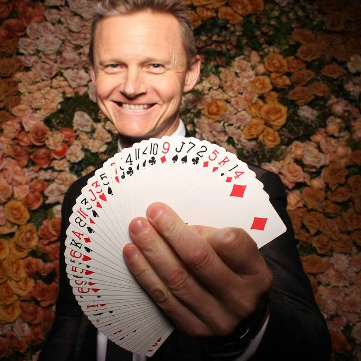 a man with deck of cards
