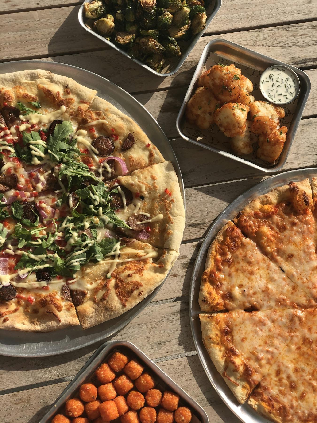 a pizza sitting on top of a table