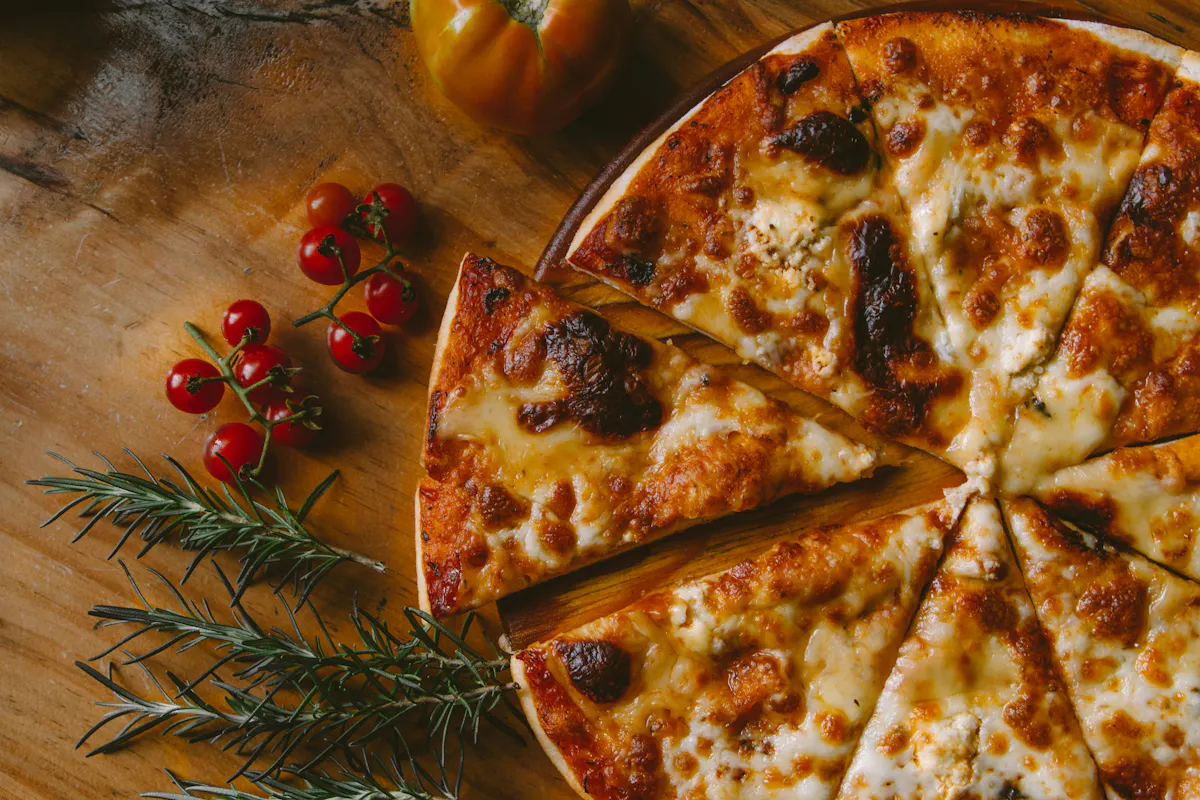 a pizza sitting on top of a table