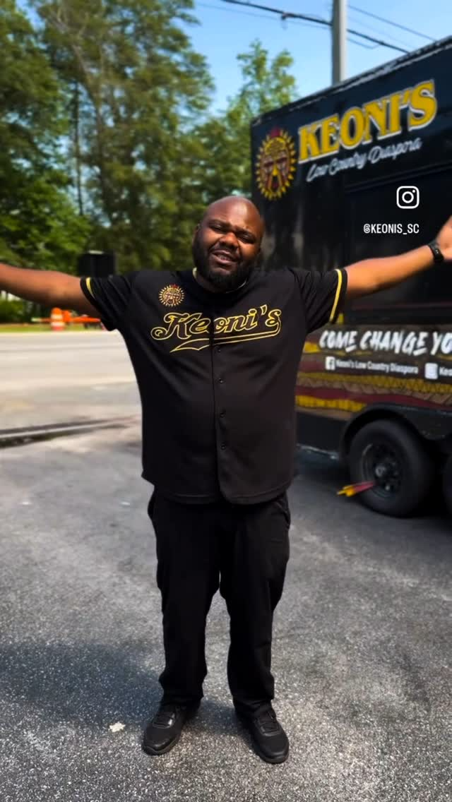 a man standing in a parking lot
