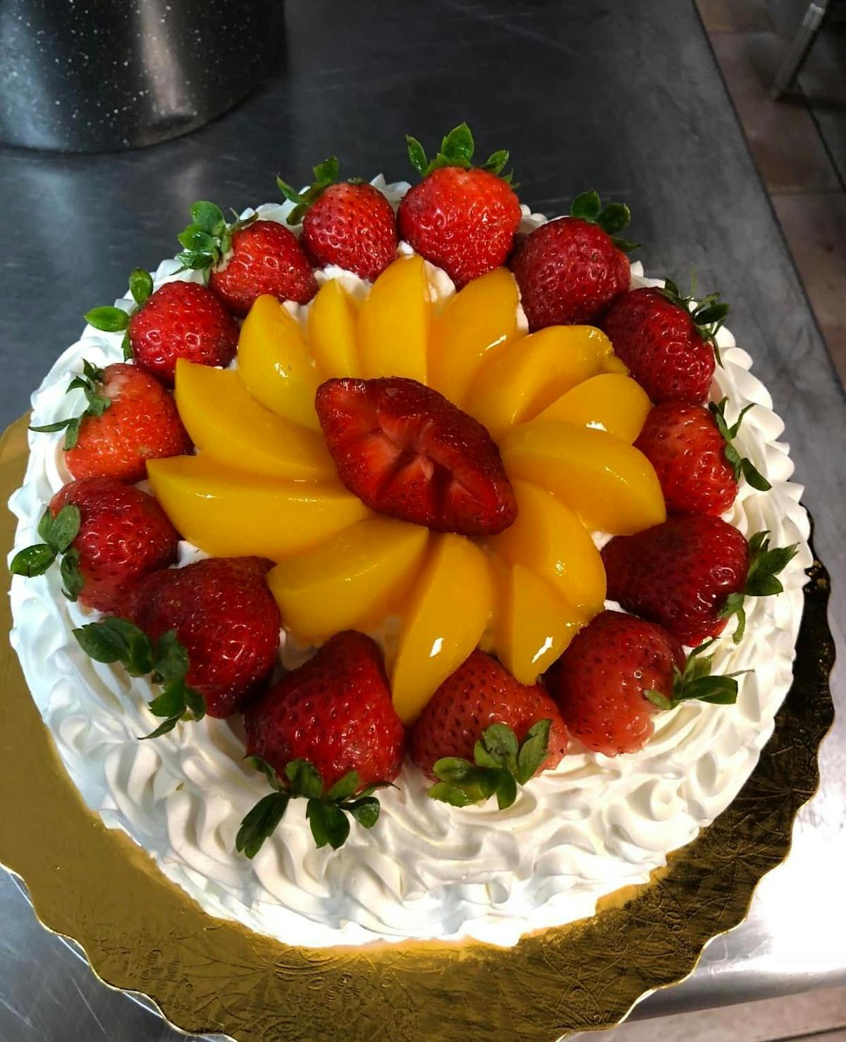 a slice of cake with fruit on a plate