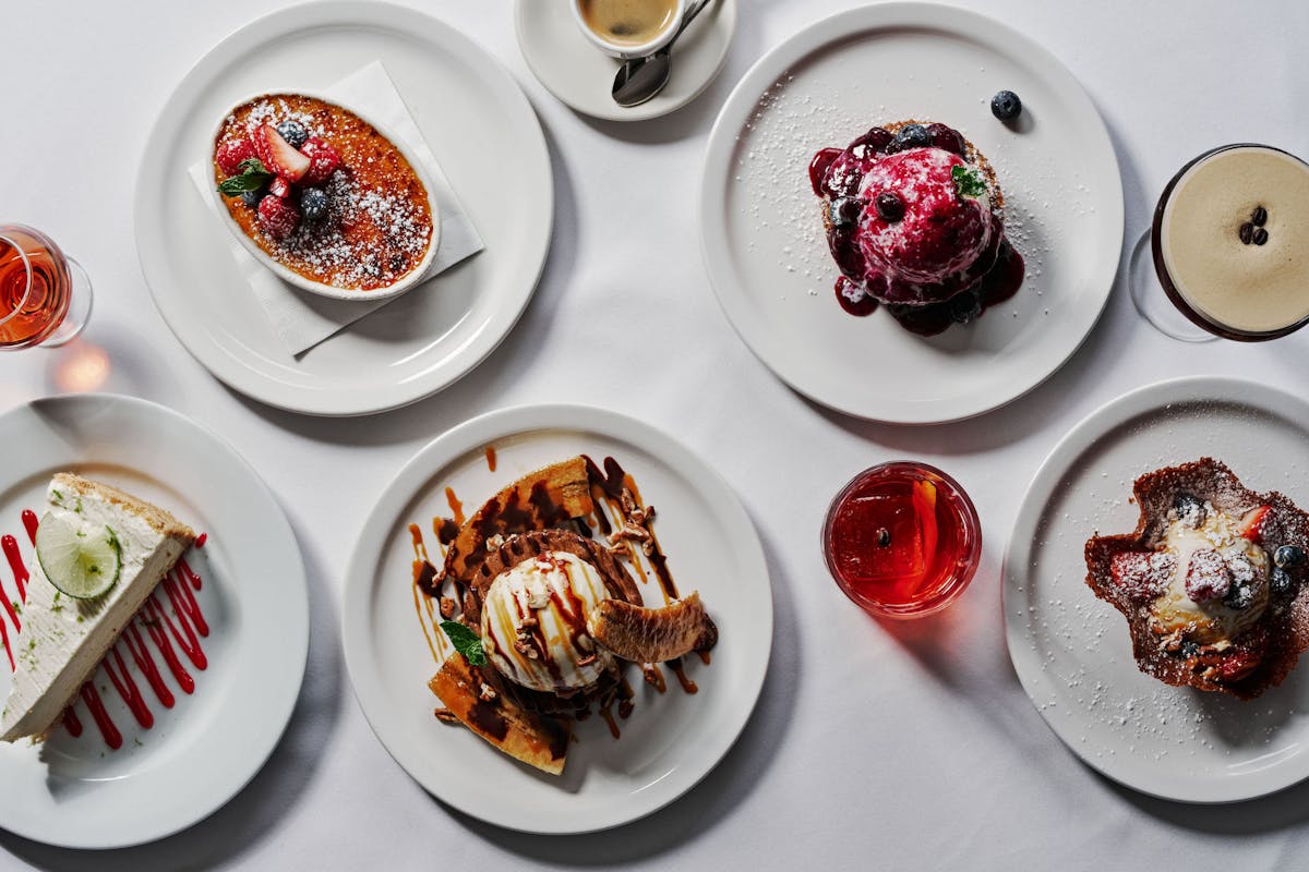 a table topped with plates of food on a plate