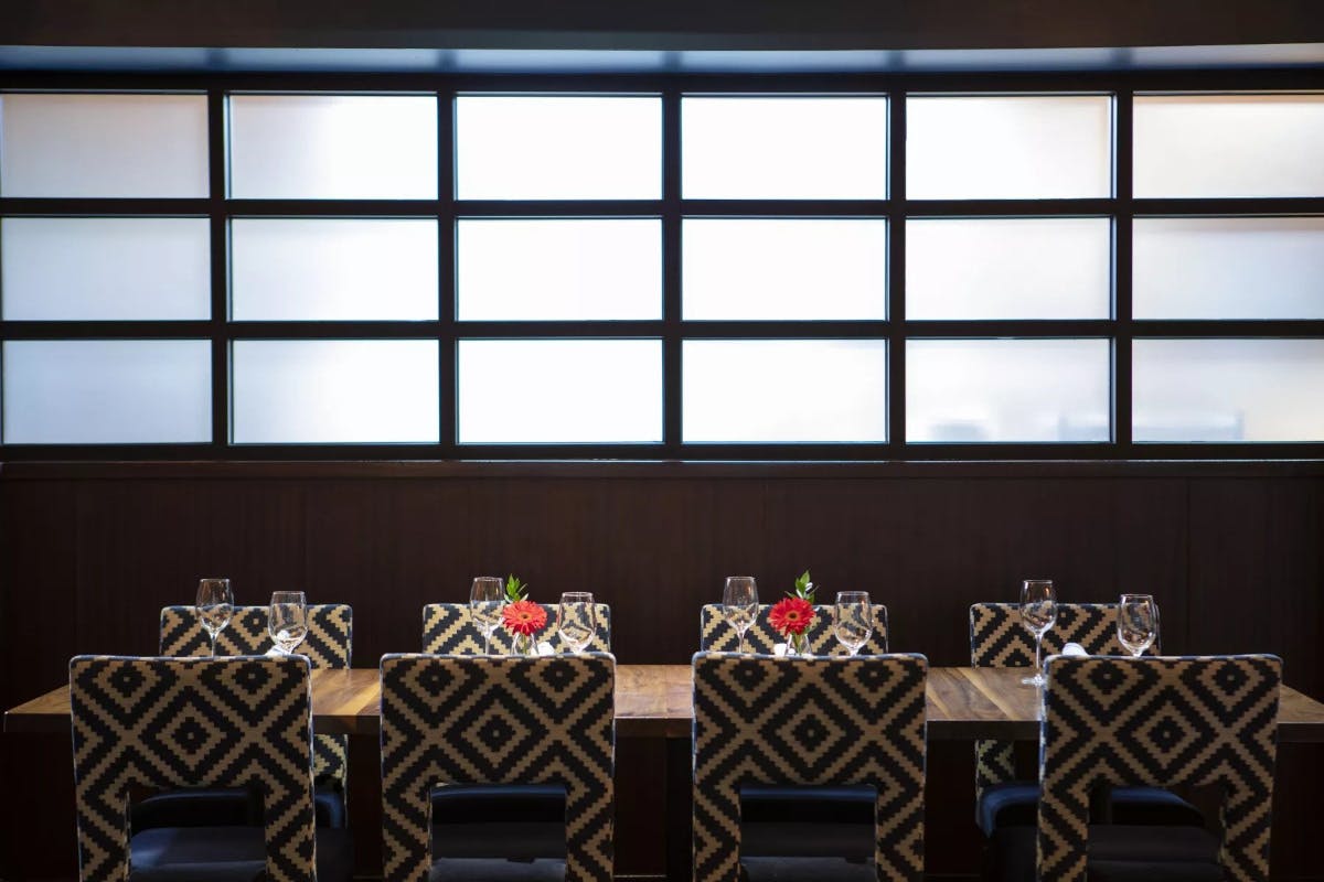 a room with tables and chairs