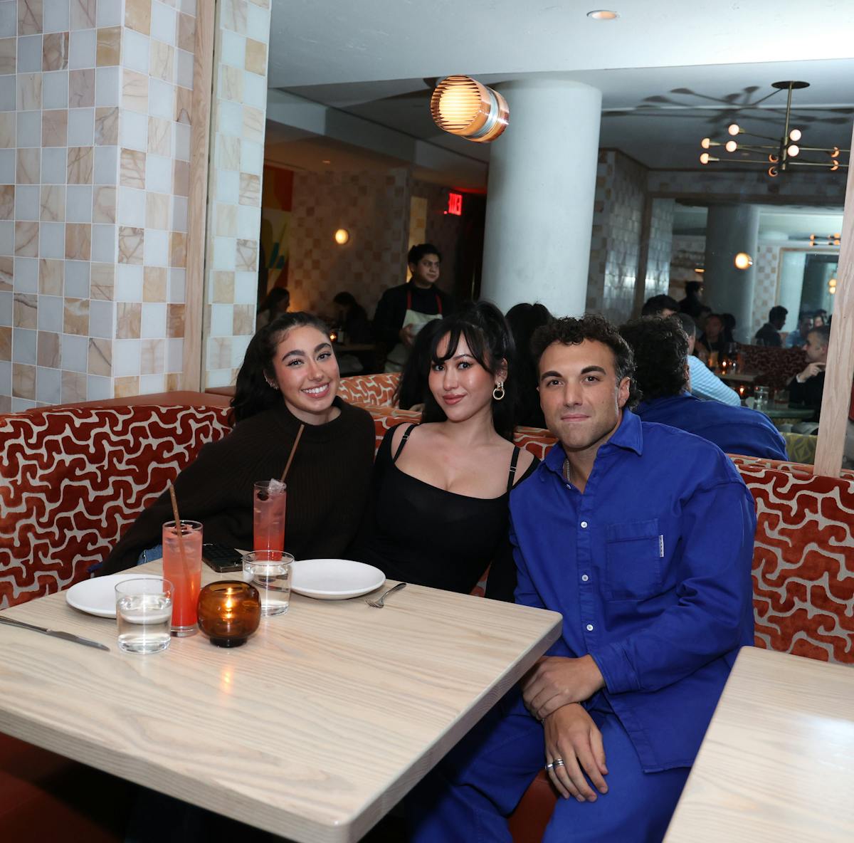 a group of people sitting at a table