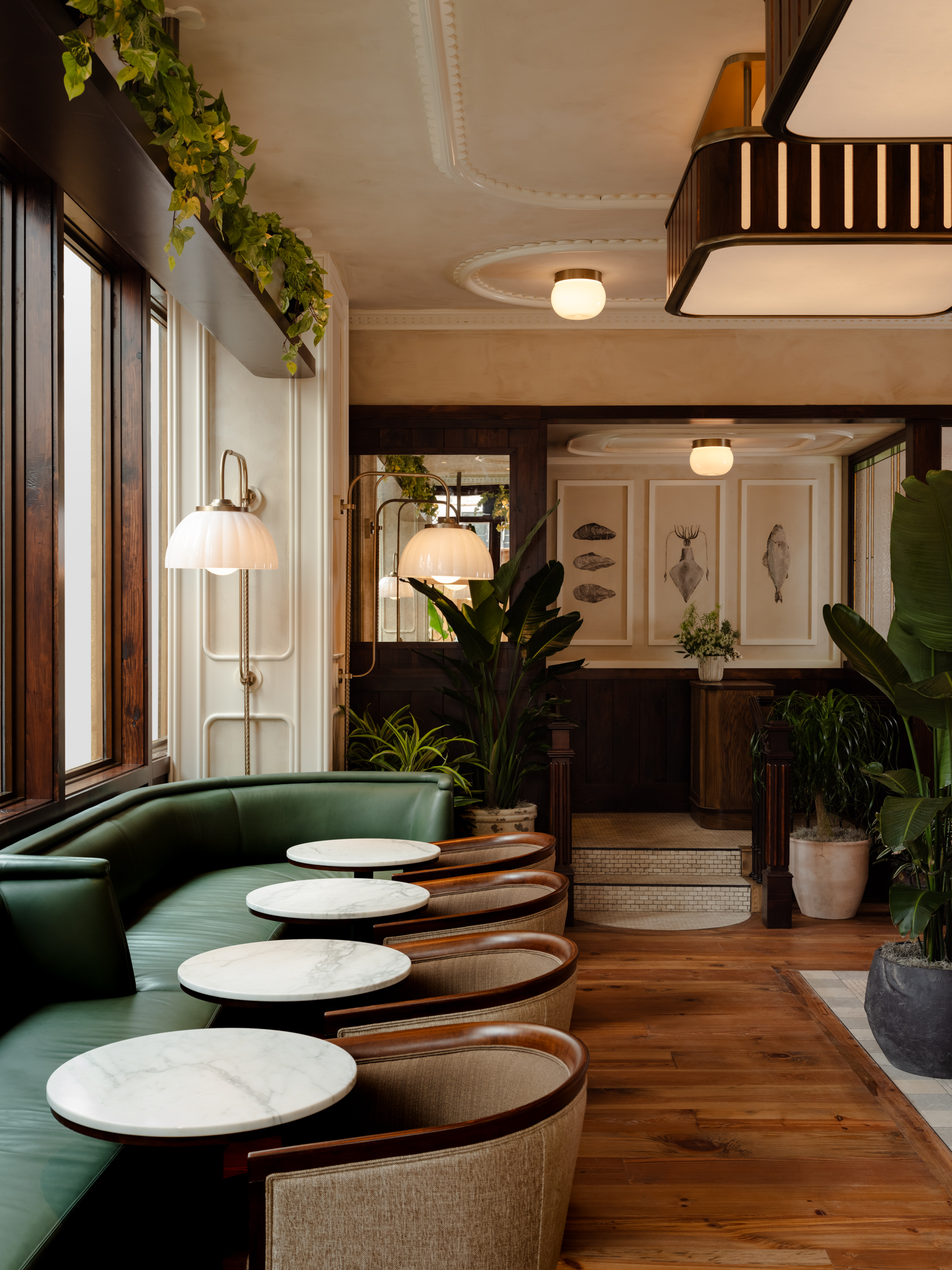 a living room filled with furniture and a large window