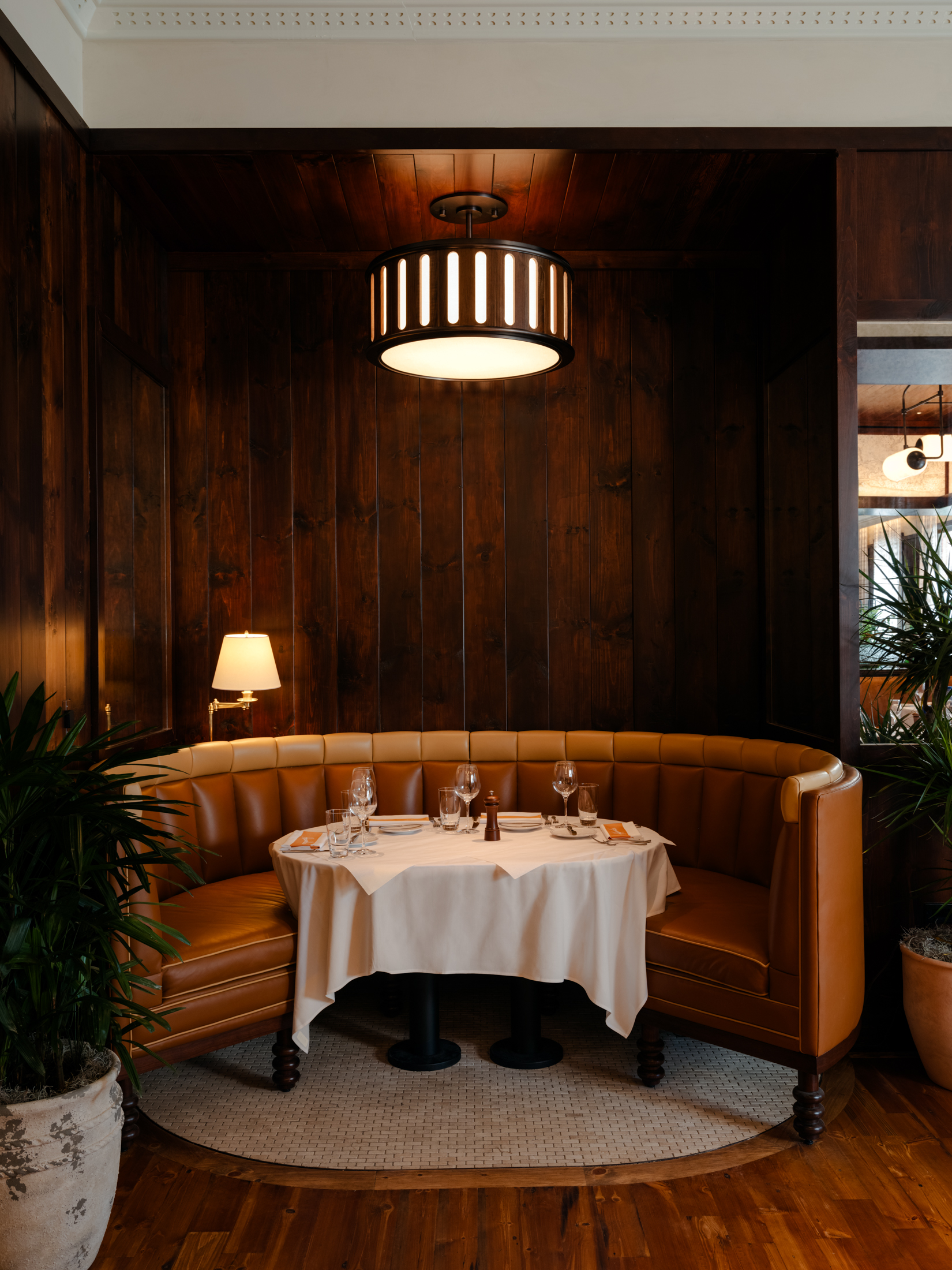 a bedroom with a large tub next to a window