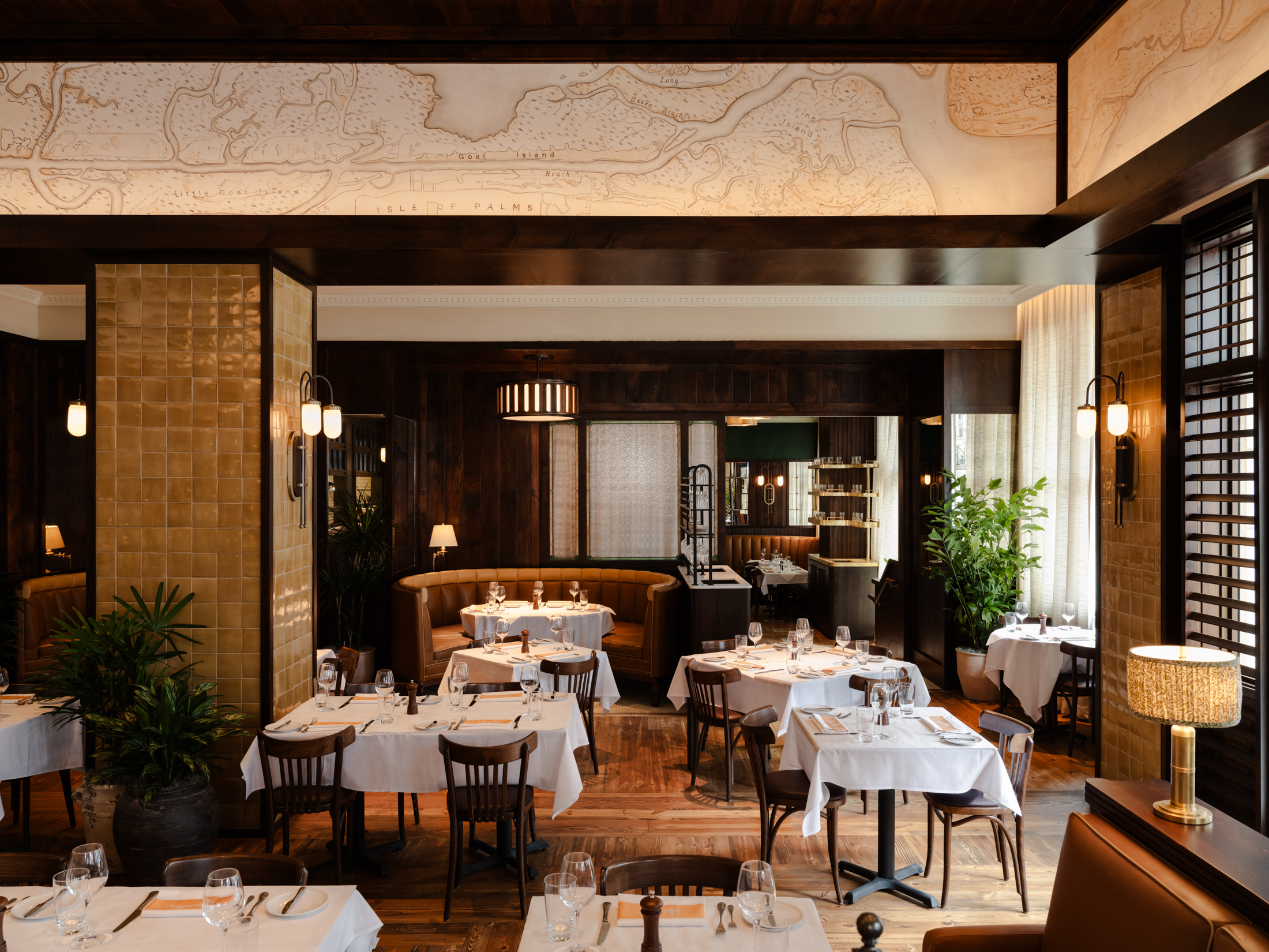 a dining room table in front of a window
