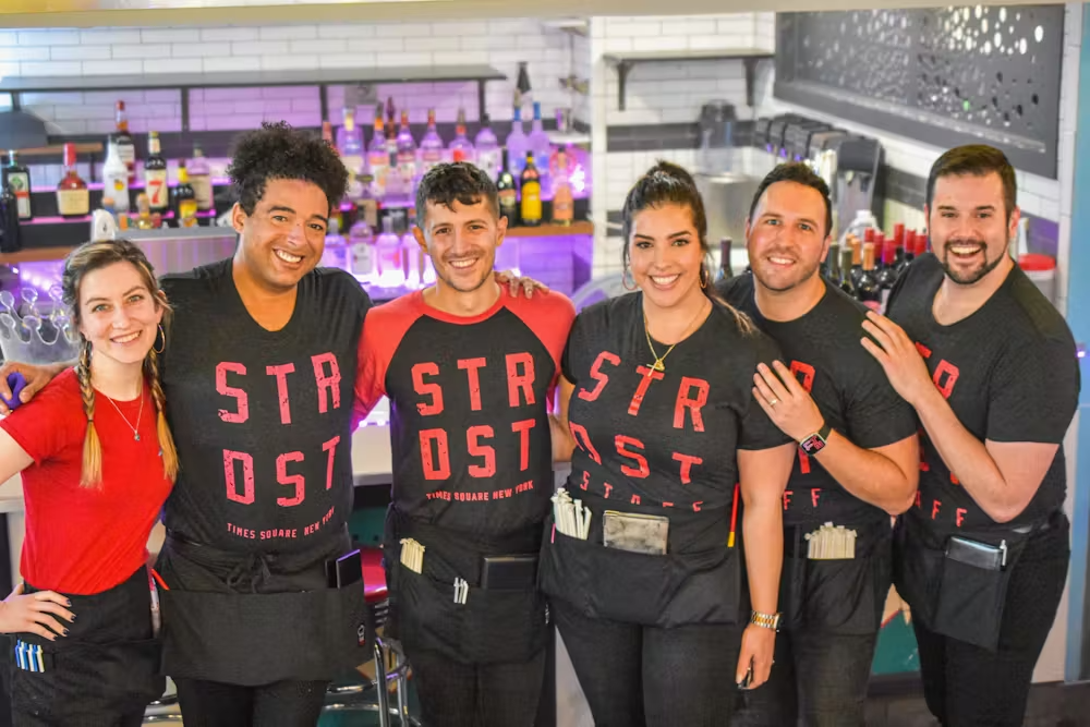 Suzy Wengel et al. posing for a photo