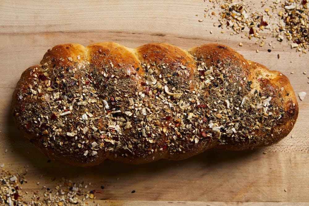 a piece of bread on a cutting board