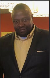a man wearing a suit and tie