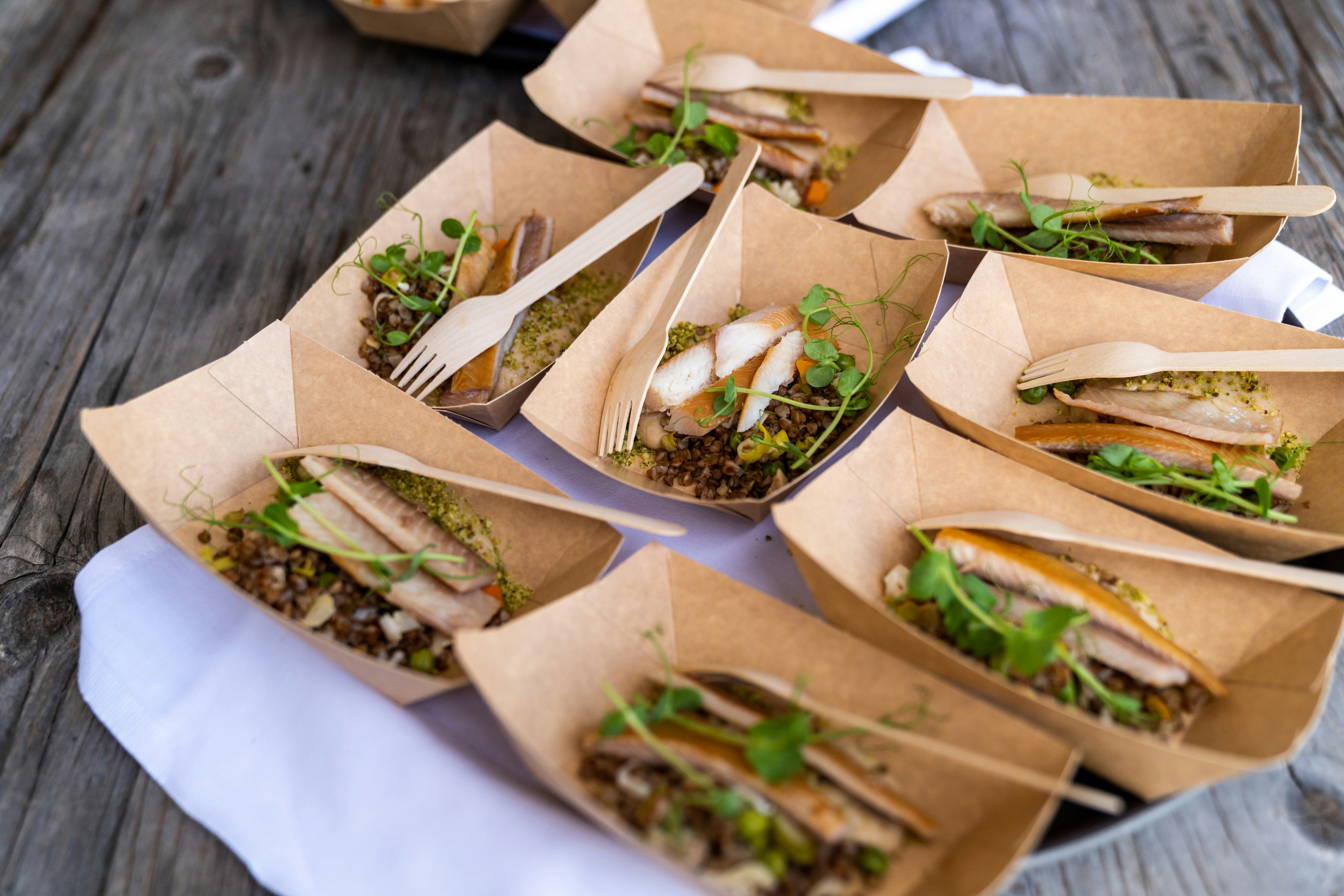 a sandwich sitting on top of a wooden table