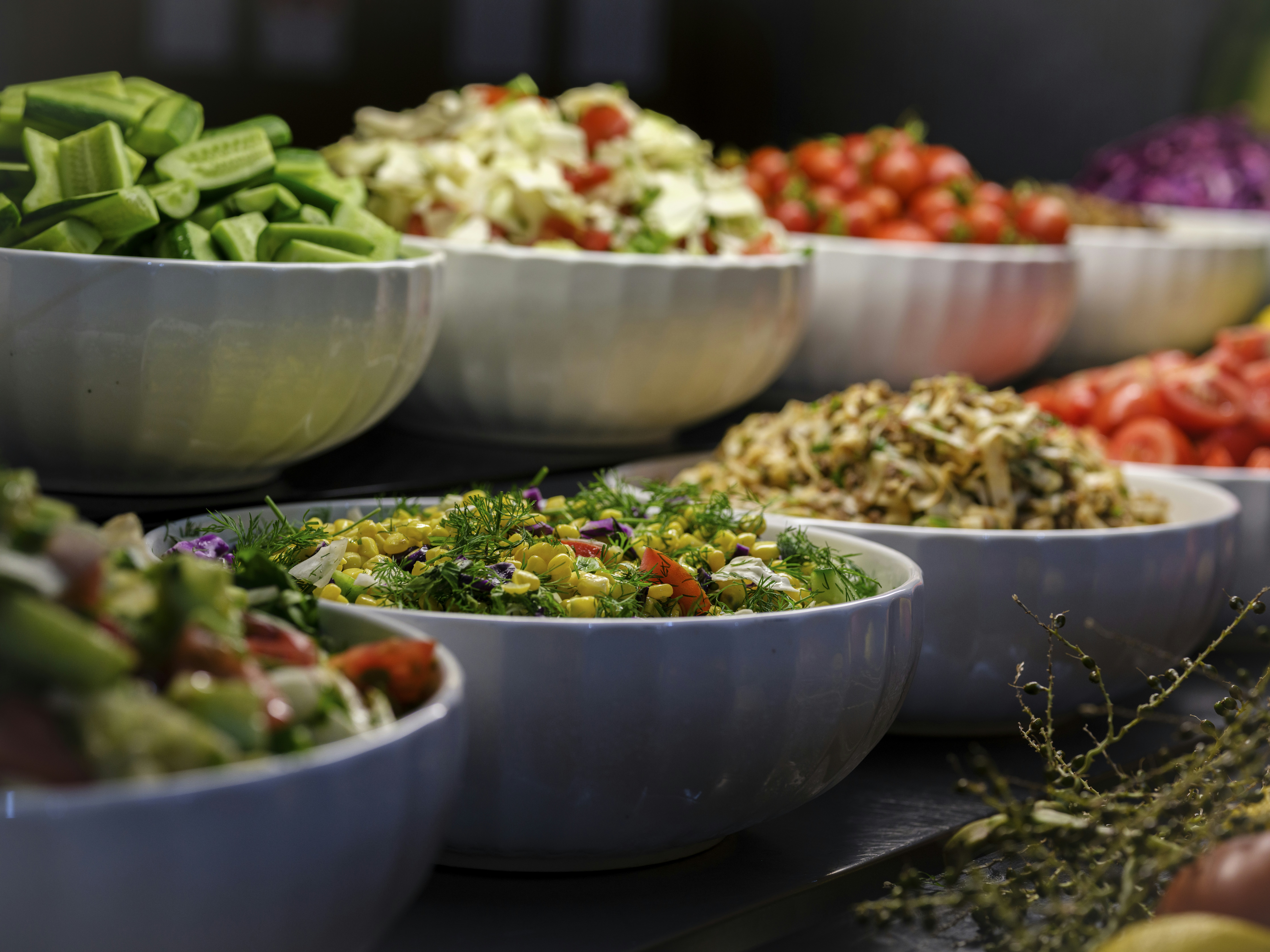 a bowl filled with different types of food on a table