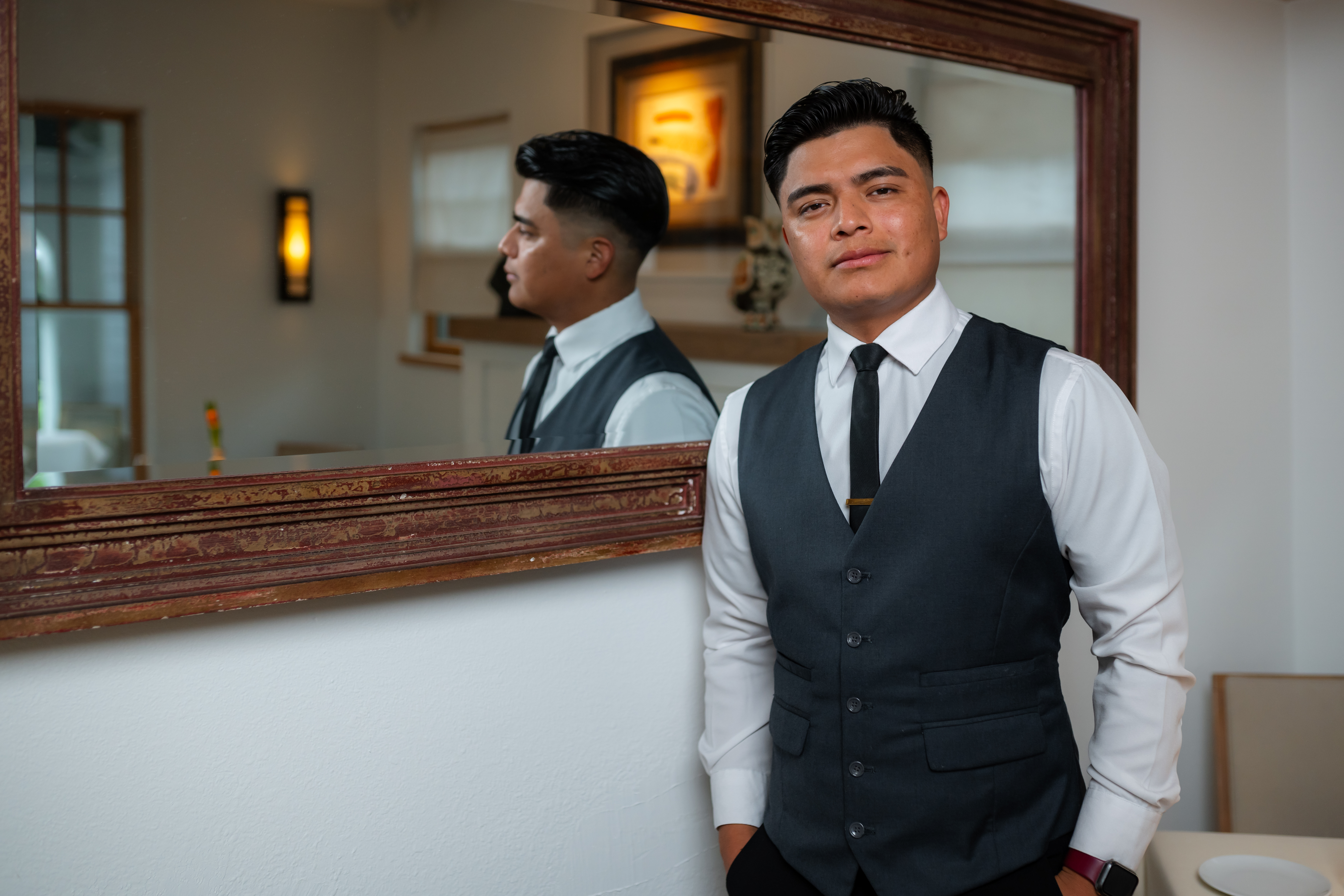 a man wearing a suit and tie