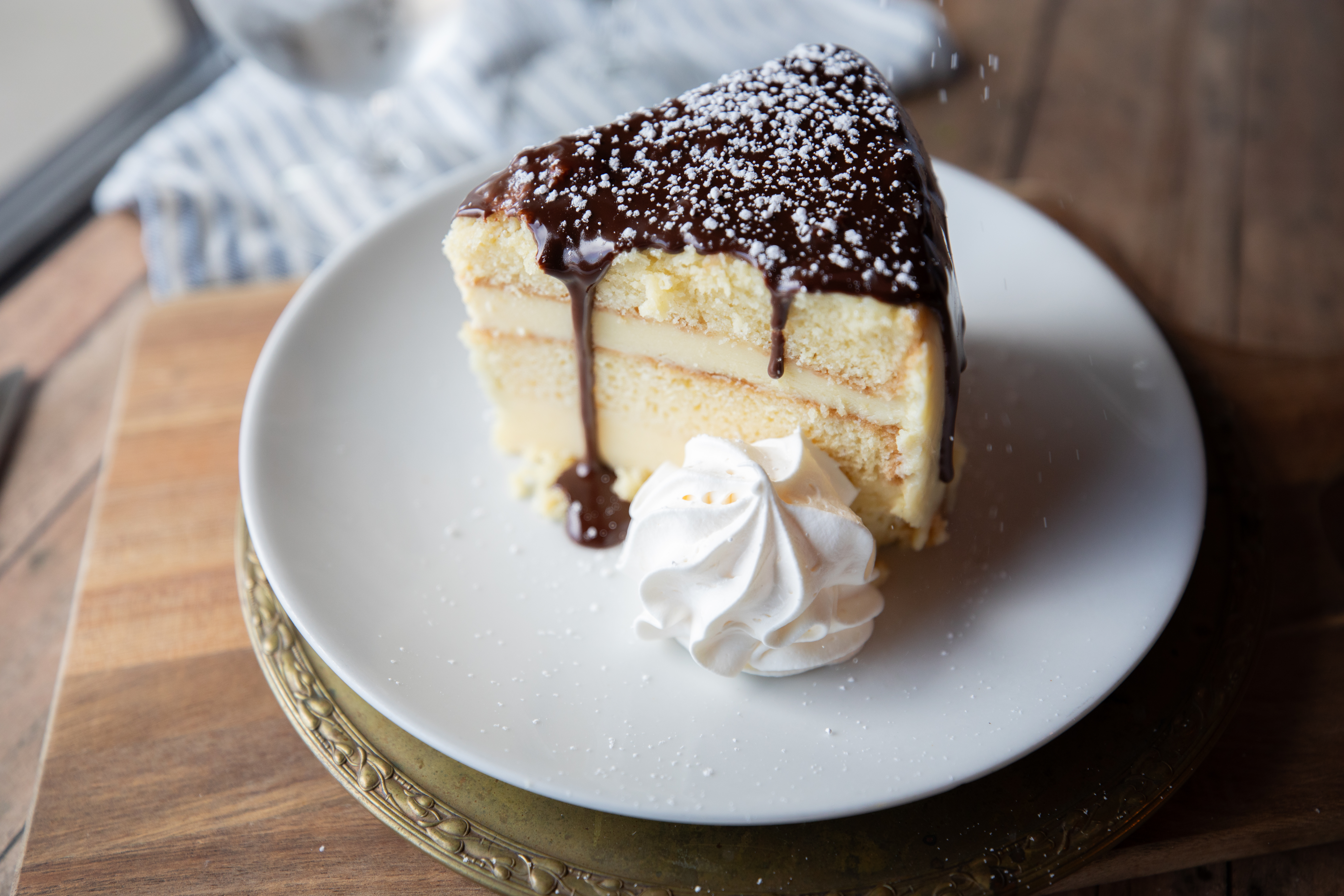 a piece of cake and ice cream on a plate