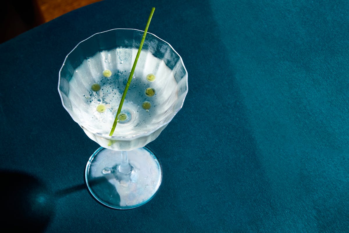 a glass with a blue bowl