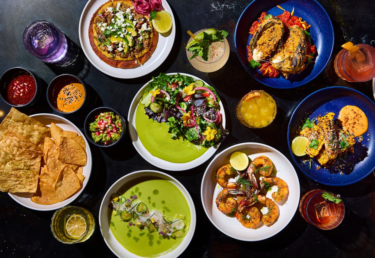 a bowl filled with different types of food on a table