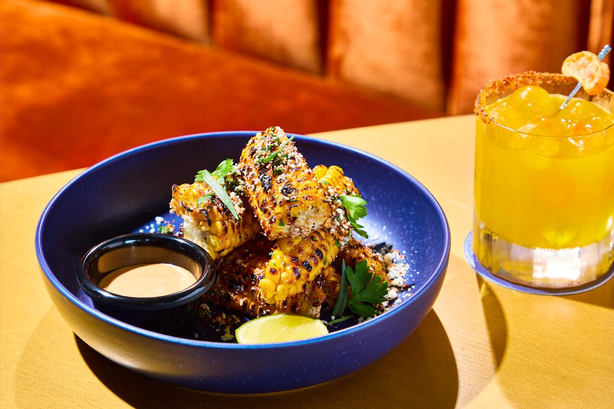 a bowl of food on a plate on a table