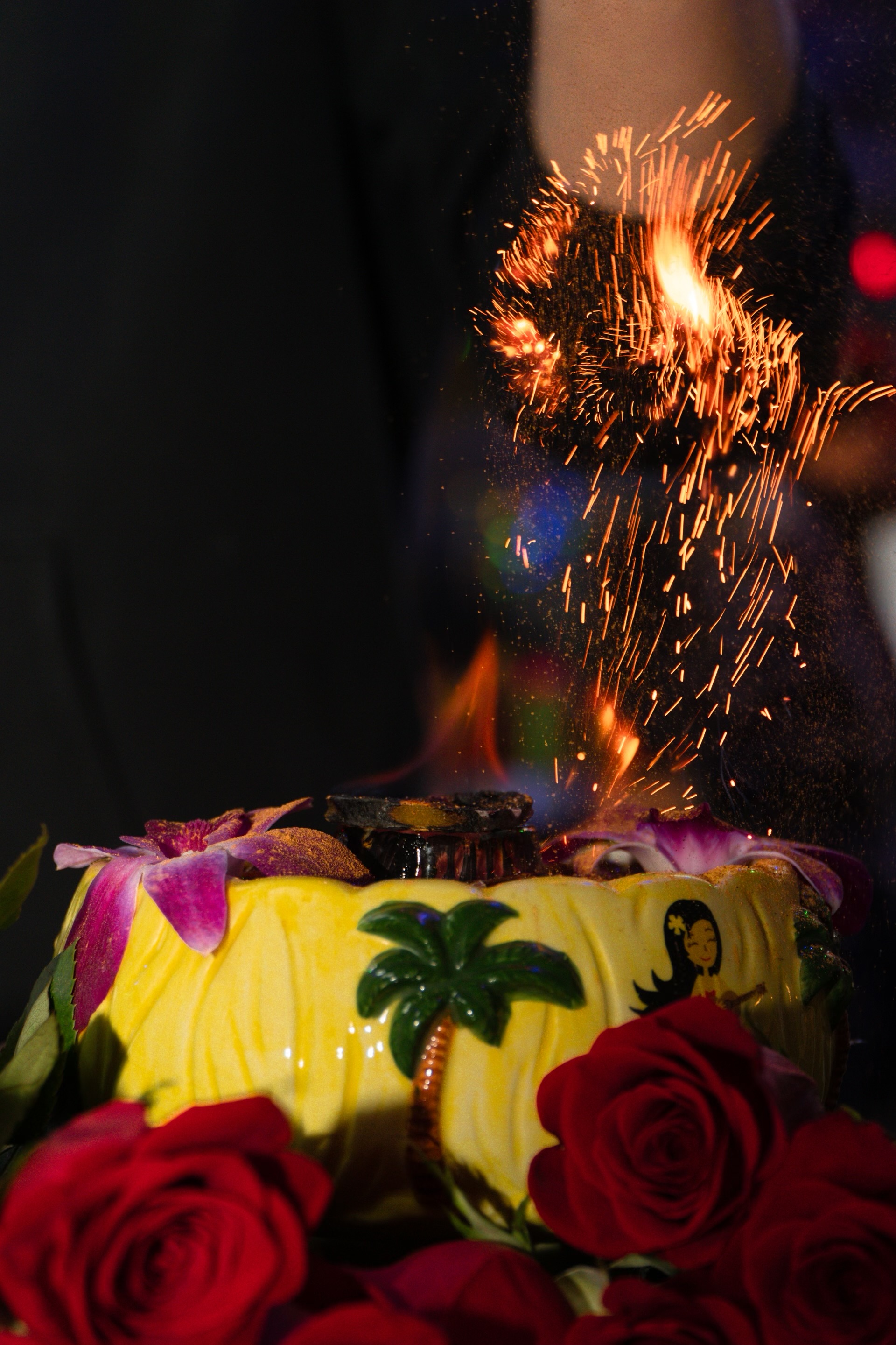 a cake with lit candles